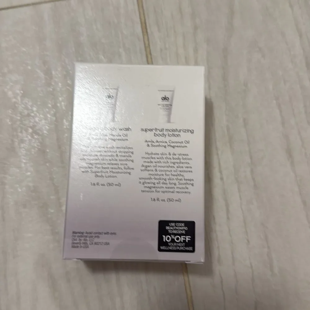NWT Alo body glow system